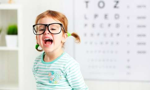 Child wearing big glasses