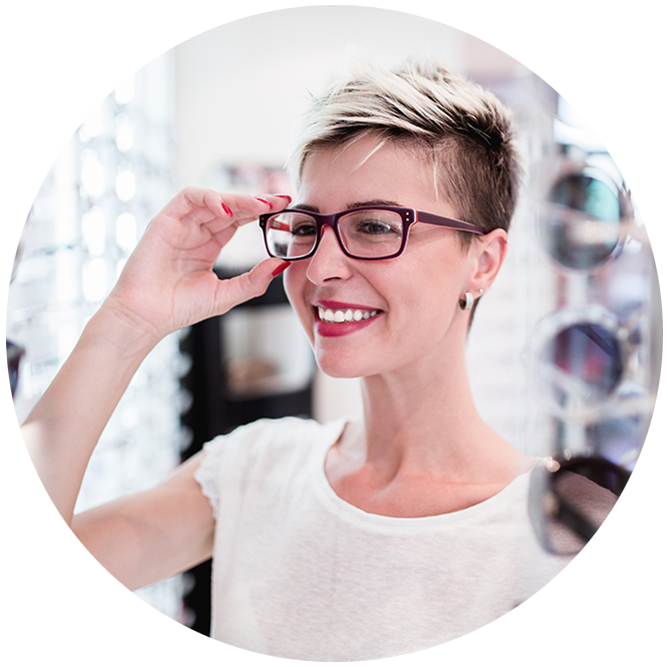 Best Frames For Coloring Woman trying on frames at Vision Pro Optical best for her face and hair color
