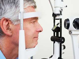 Man Receiving Detached Retina Treatment From Optomistrist at Vision Pro Optical In Minnesota