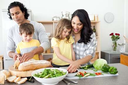 Family cooking dinner together