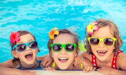 Kids with colorful sunglasses on