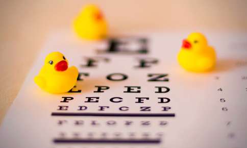 Rubber ducks on eye exam letters 