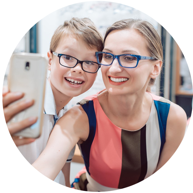 Examples-of-cool-skin woman and son trying on glasses best for cool skin tones