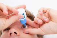 Putting in eyedrops