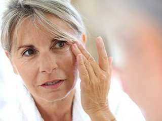 Woman with a stye on her eyelid